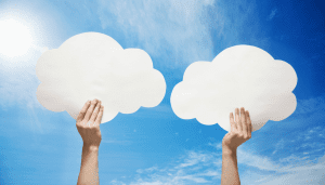 Haverhill Accountants & Software Two hands holding paper clouds